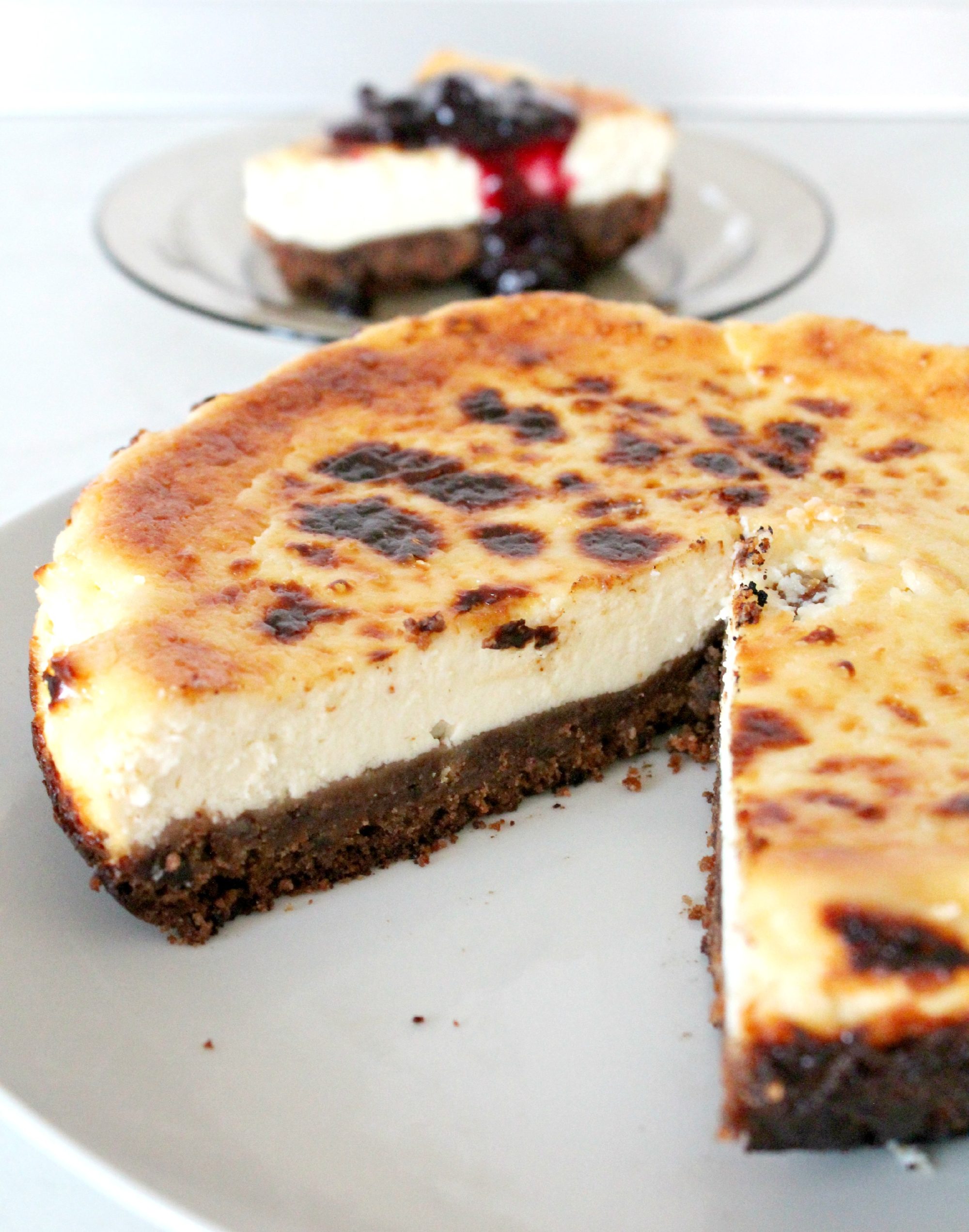 Gluten free cheesecake with chocolate chips & mixed berries jam