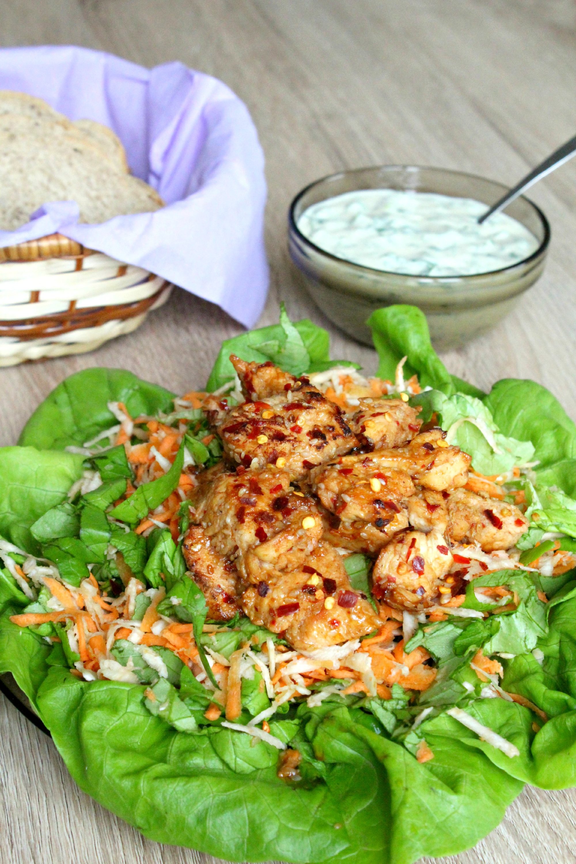 Yummy and healthy spicy chicken salad with root vegetables and yogurt mustard sauce