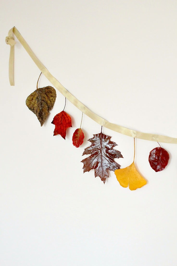 Leaves garland made with real leaves in various fall colors and ribbon