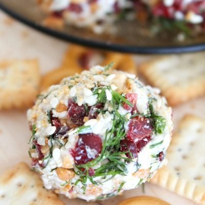 Goat cheese balls with feta, sesame seeds, cranberries & dry roasted peanuts