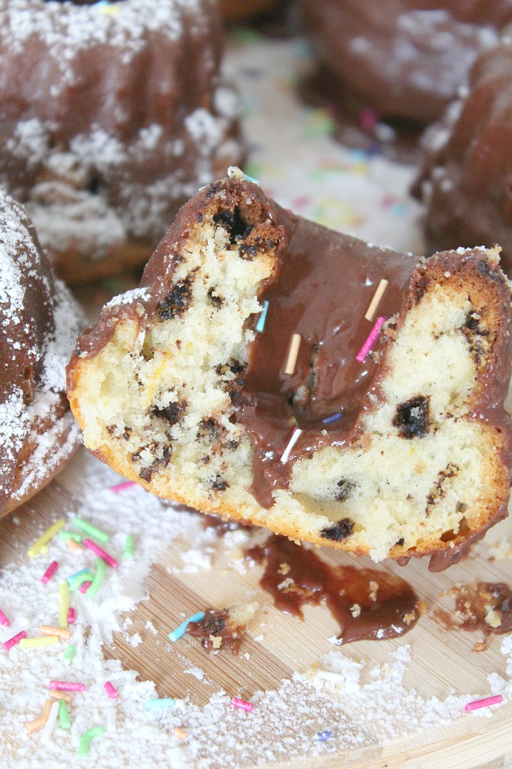 These Mini Orange Bundt Cakes are so cute and lovely! Full of orange flavor and glazed with chocolate, these make an amazing festive dessert!