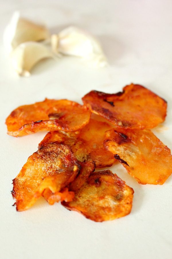 Homemade Baked Potato Chips In Garlic Vinegar Tomato Sauce