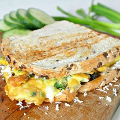 Omelette Sandwich With Sun Dried Tomatoes, 3 Cheeses & Green Onions