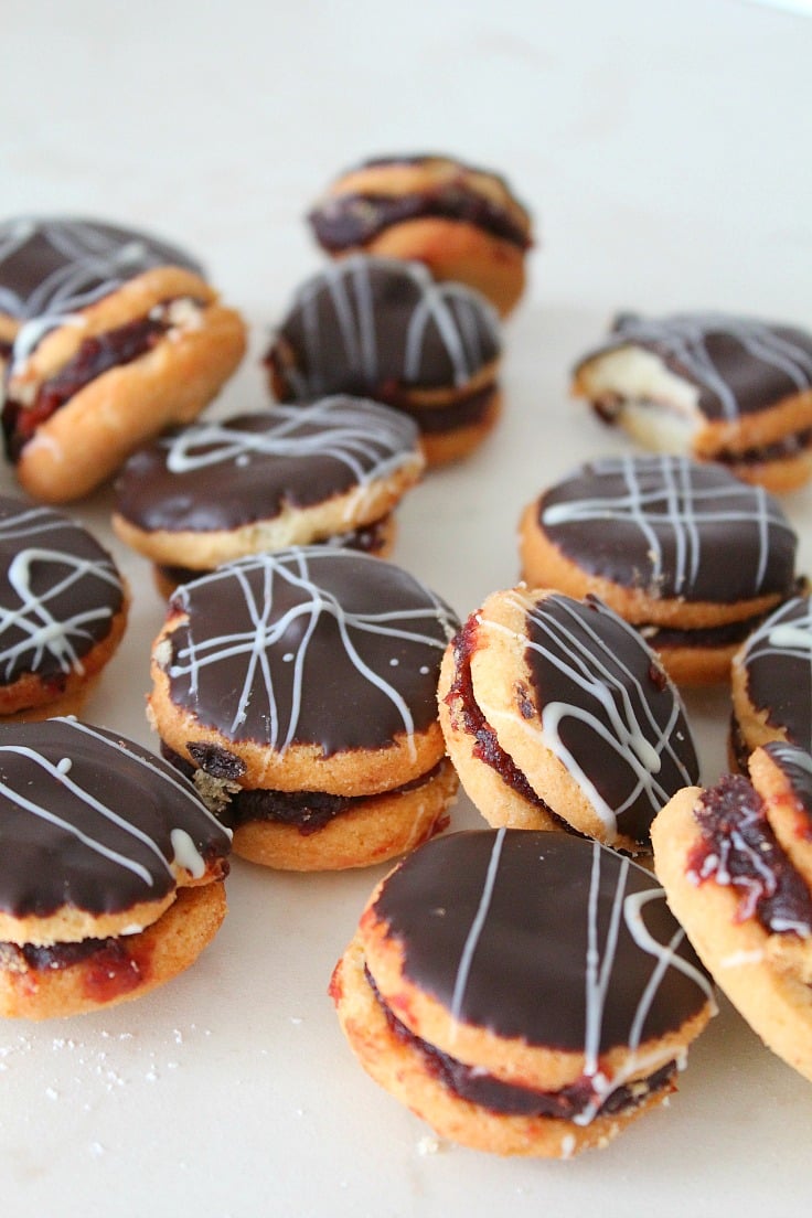 Chocolate covered sandwich cookies recipe filled with jam