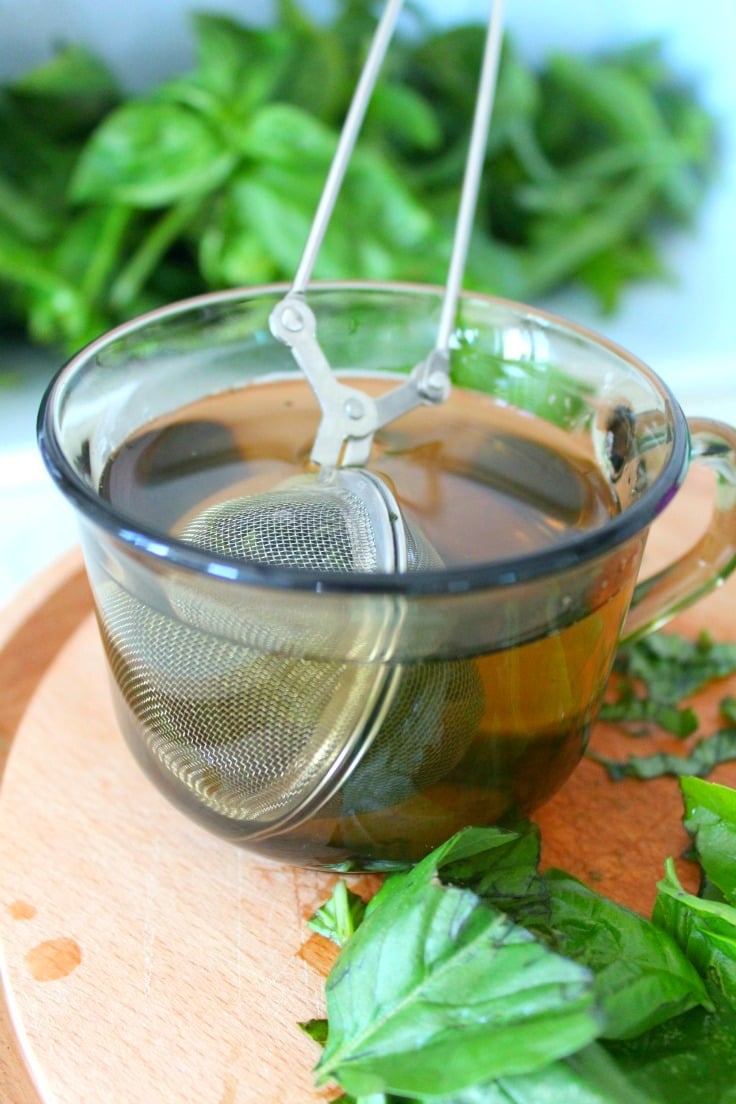 Image of a cup of fresh basil tea, made following the below instructions on how to make basil tea