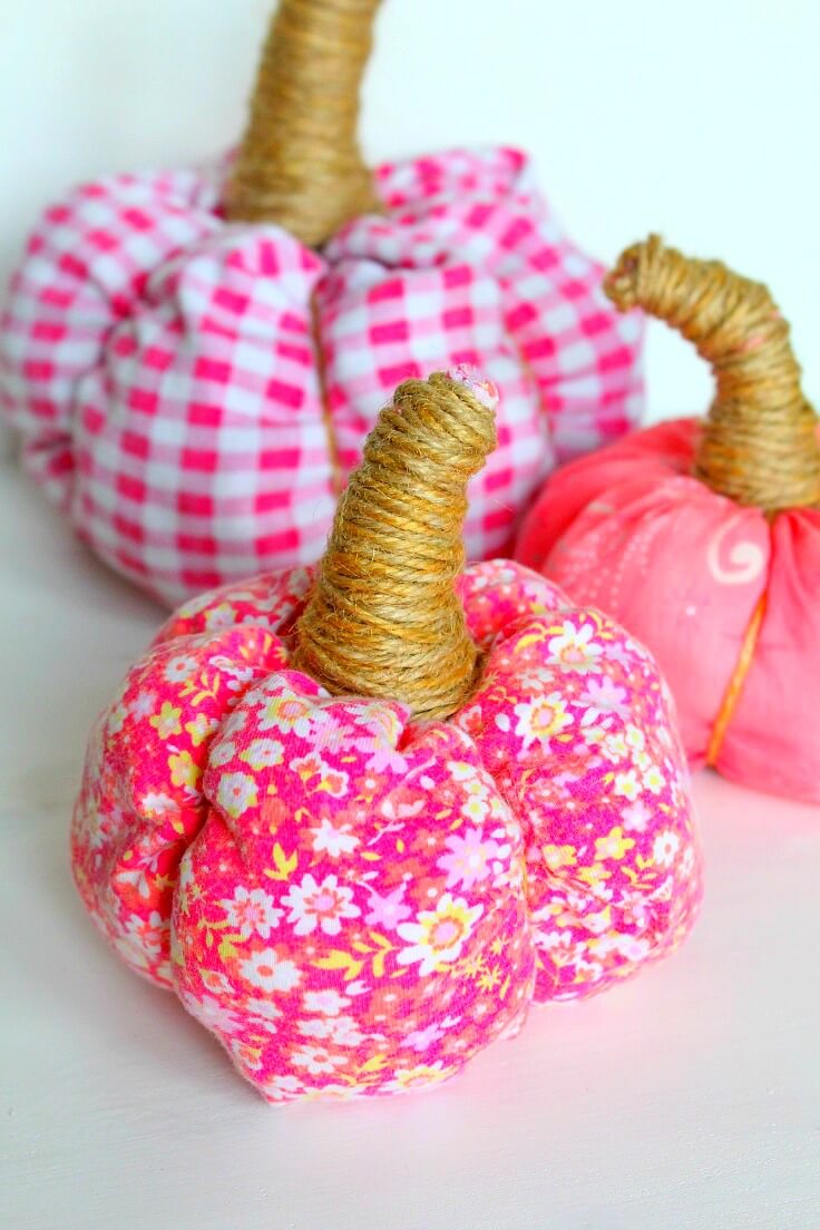 Colorful non traditional fabric pumpkins with twine stem