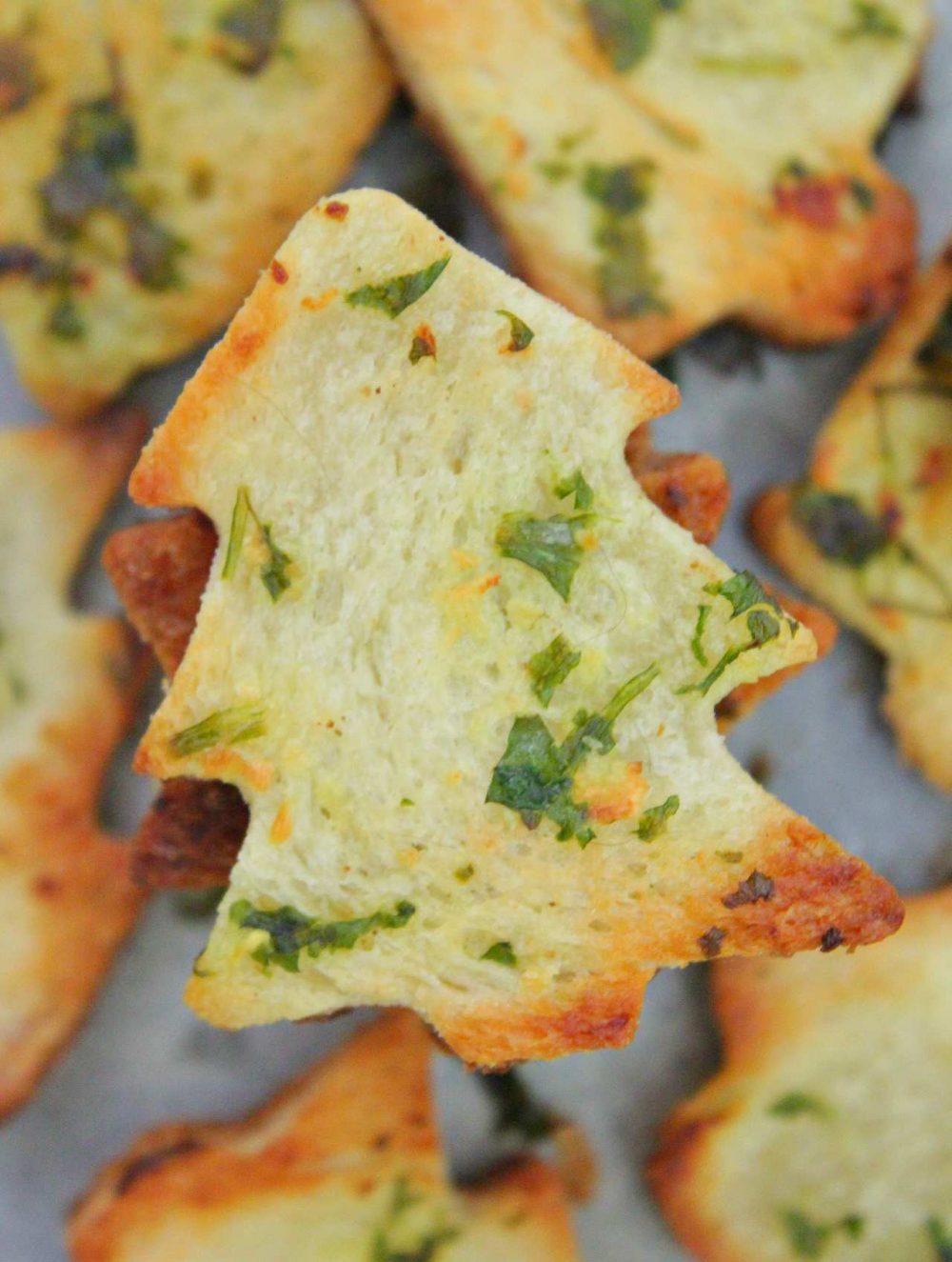 Garlic bread chips cut in the shape of Christmas tree