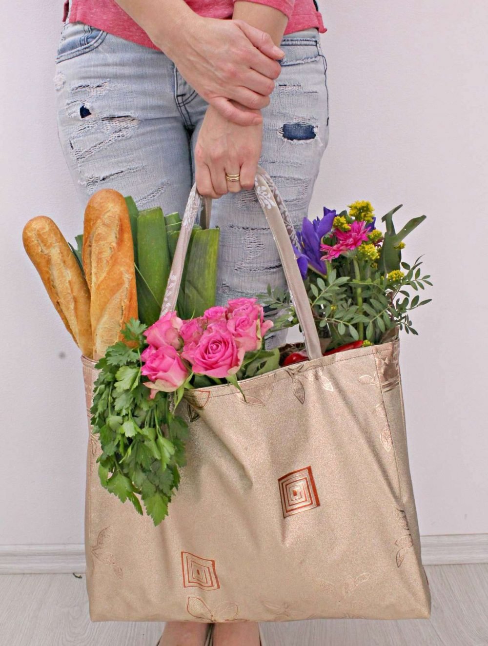 Shopping bag pattern for a vinyl tote bag, filled with flowers herbs and bread