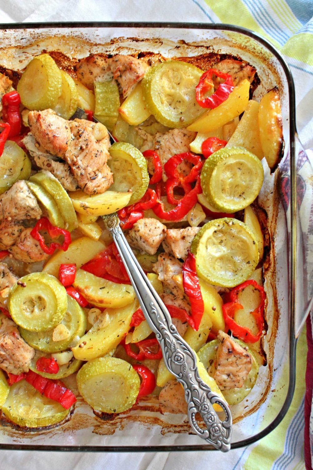 Baking dish with sweet and picy turkey breast and vegetables, made with brown sugar, paprika lemon juice and herbs