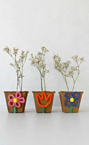 Mini flower pots made from peat pots and chenille pipe cleaner