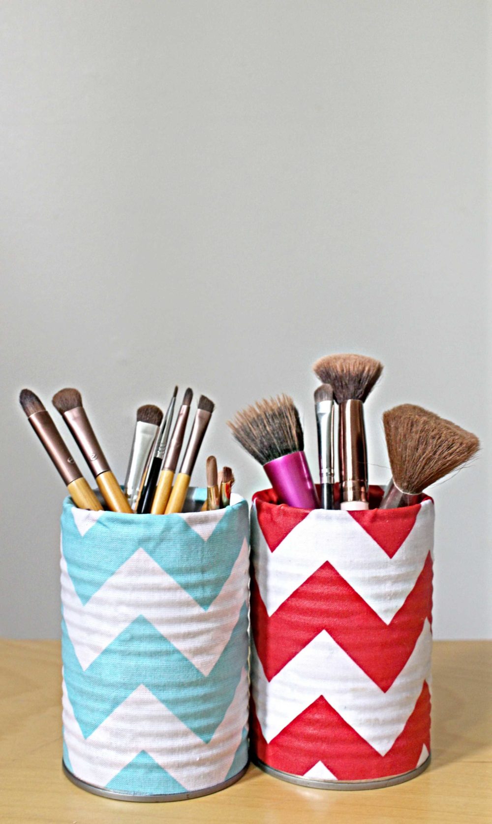 makeup storage organizer with tin cans and fabric