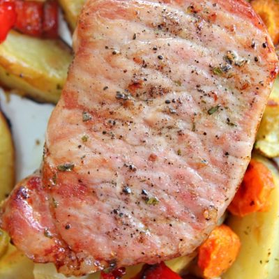 Oven roasted pork chops with honey glazed vegetables