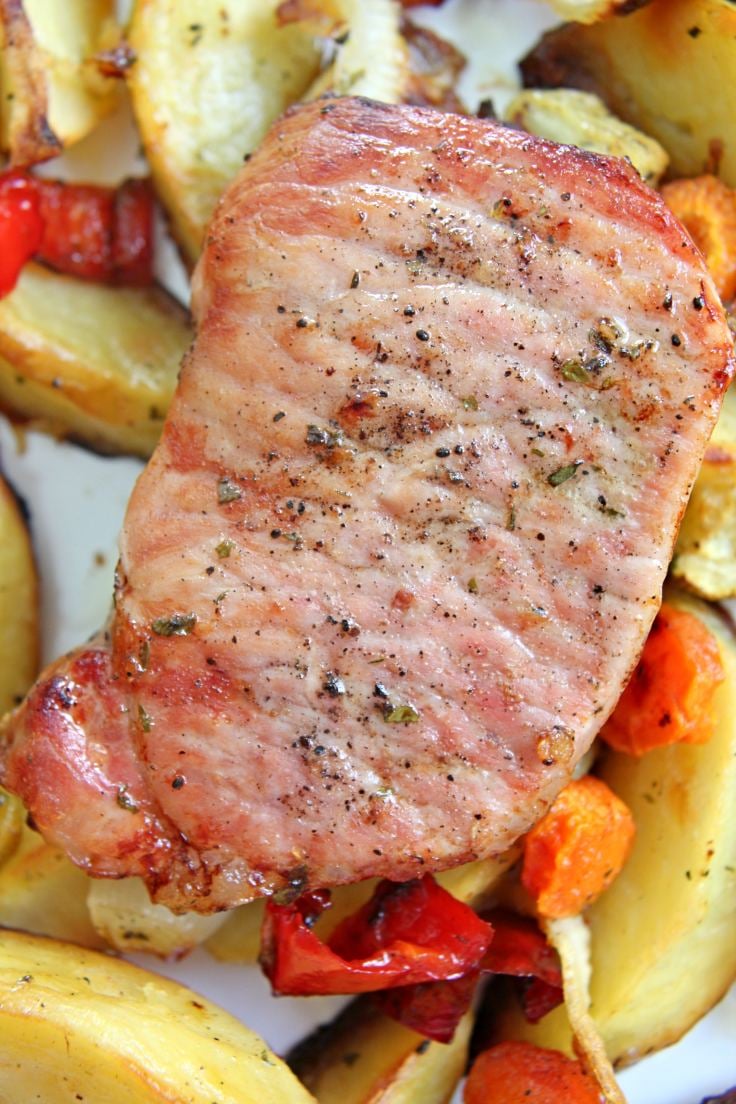 Oven roasted pork chops with honey glazed vegetables