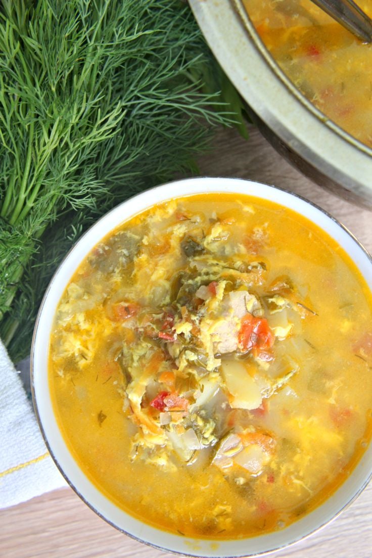 Savory, vegetable loaded soup with pork chops