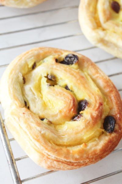 Puff Pastry Pinwheels Filled With Vanilla Cream And Raisins