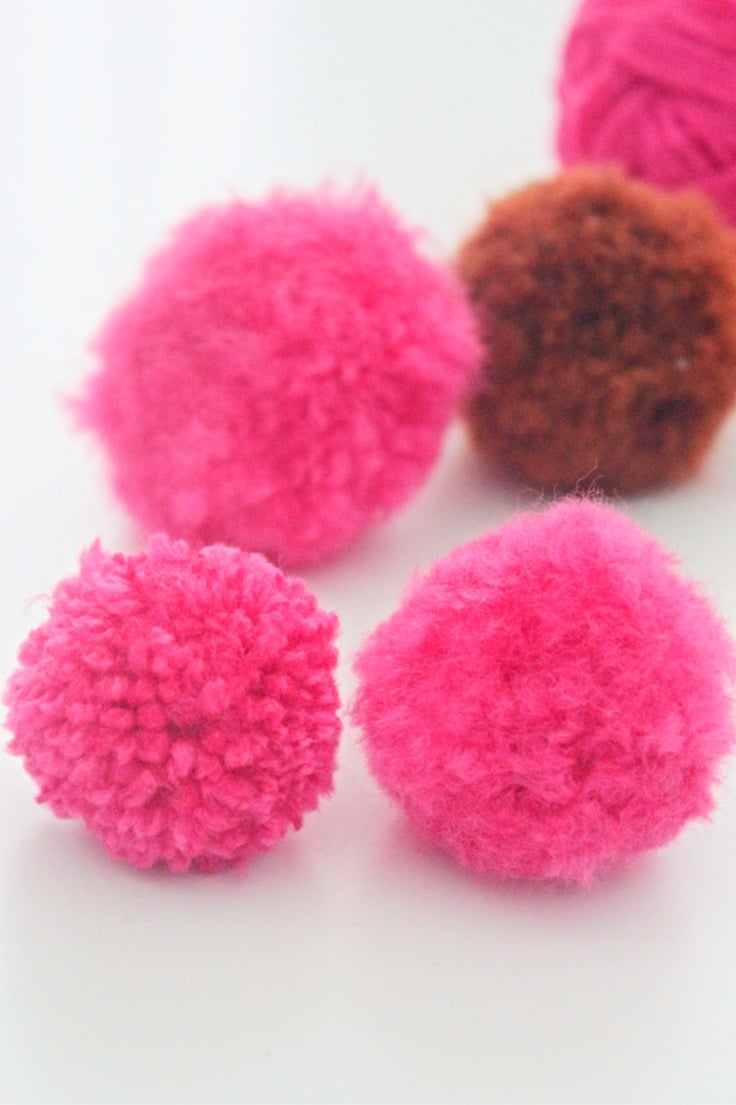 Pink fluffy pom pom