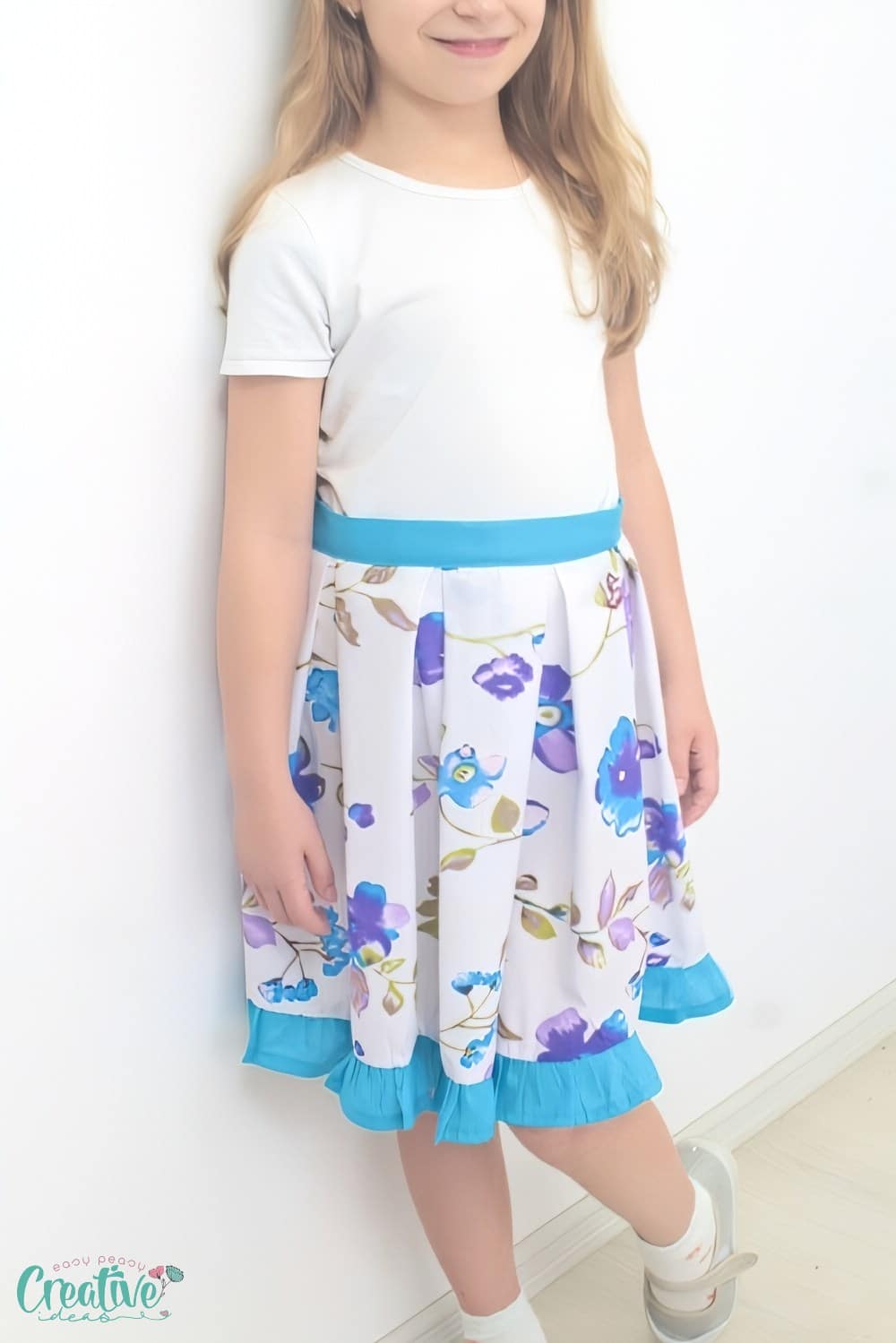 Skirt with pleats on a little girl