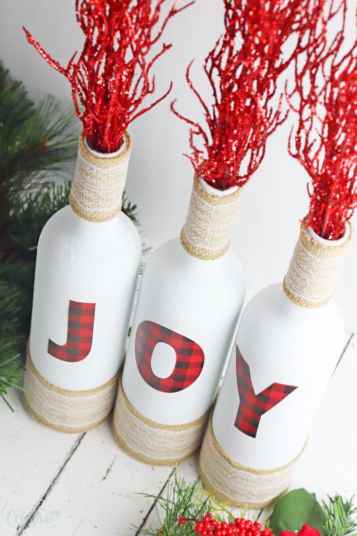 Joy Christmas bottles