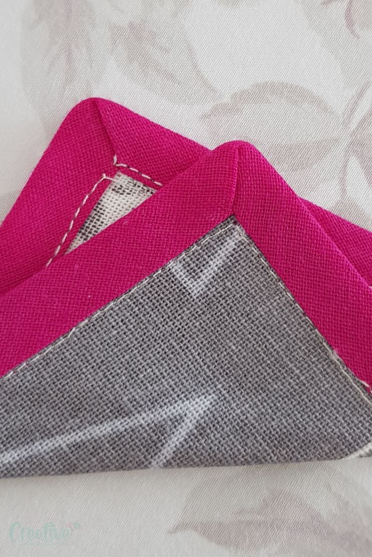 Sewing mitered corners with bias tape