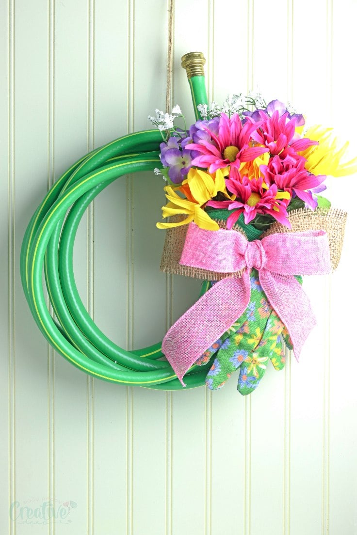 How to Make a Garden Hose Wreath with Blooming Wellies – Home is