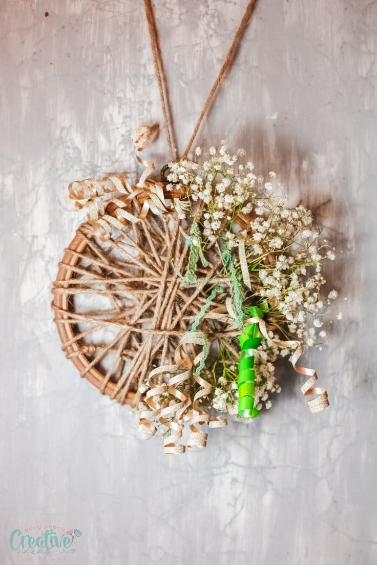 Spring Wreath Made From Embroidery Hoops and Old Book Pages.