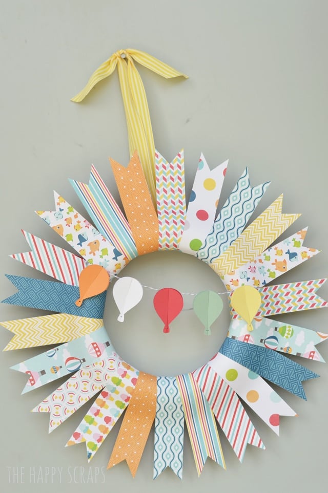 Image of summer wreath made with ribbon and hot air balloons from paper