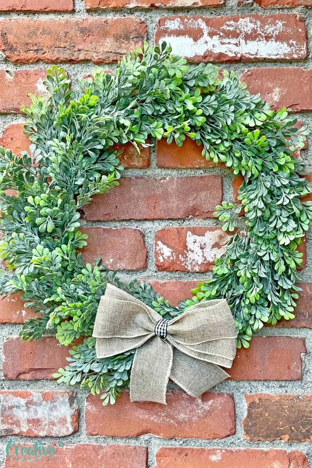 Christmas wreath with fake boxwood