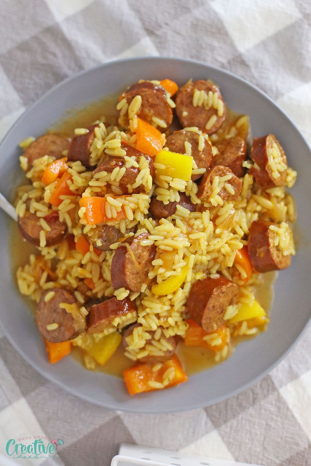 Overhead image of crockpot kielbasa in a serving plate