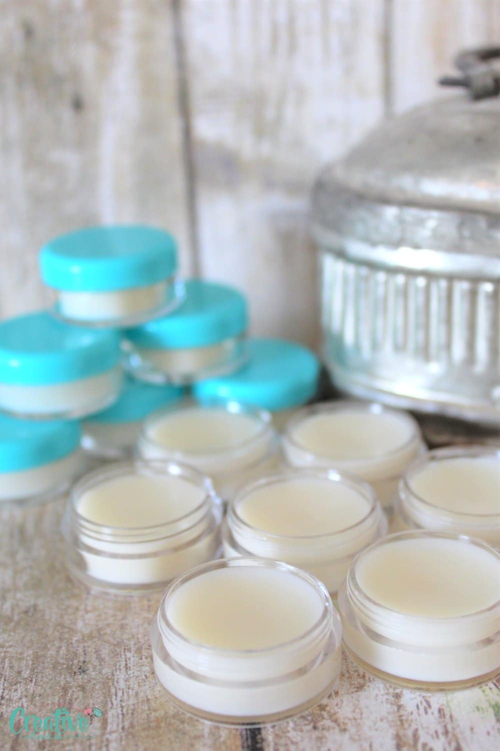 Homemade headache relief balm in small jars