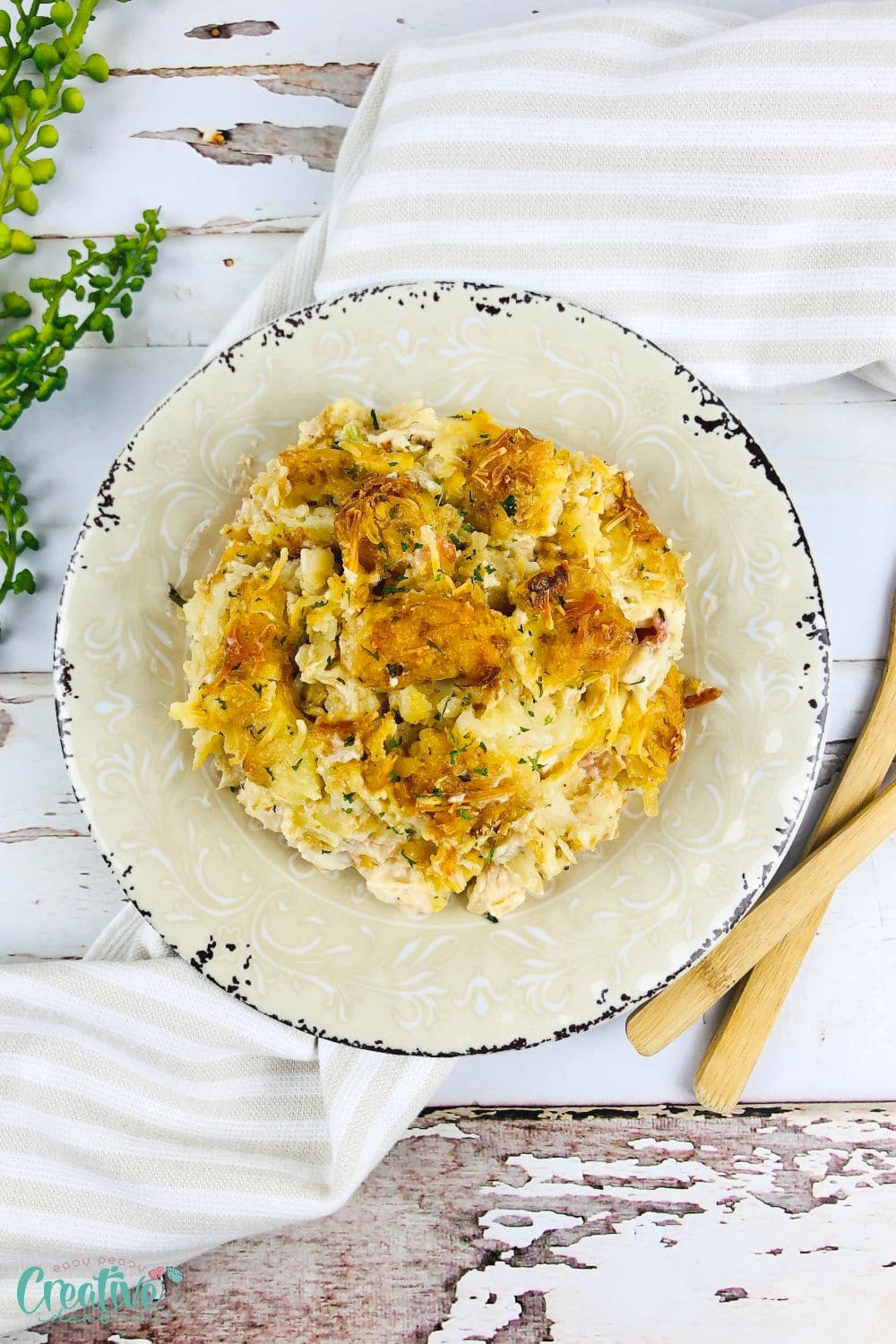 Over head image of tater tot casserole with chicken and Alfredo sauce