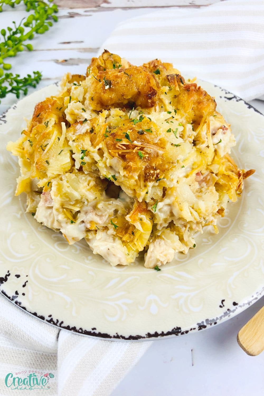 Angle image of tater tot hotdish with chicken and alfredo