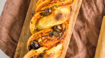 Image of a loaf of vegan pizza babka recipe
