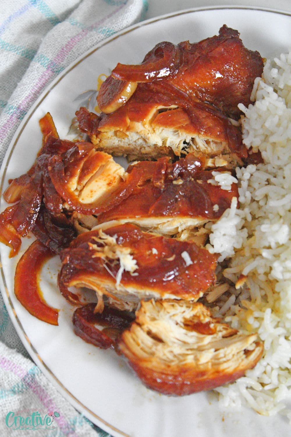 Image of a piece of sliced honey bourbon chicken