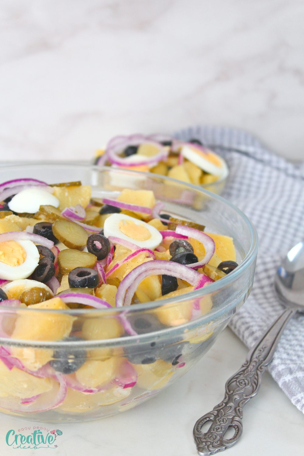 Mediterranean potato salad in a large salad bowl