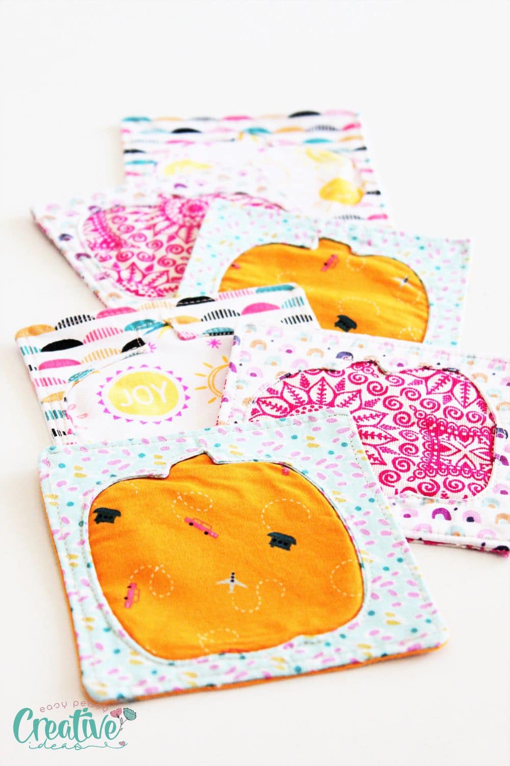 Reverse applique pattern for pumpkin coasters