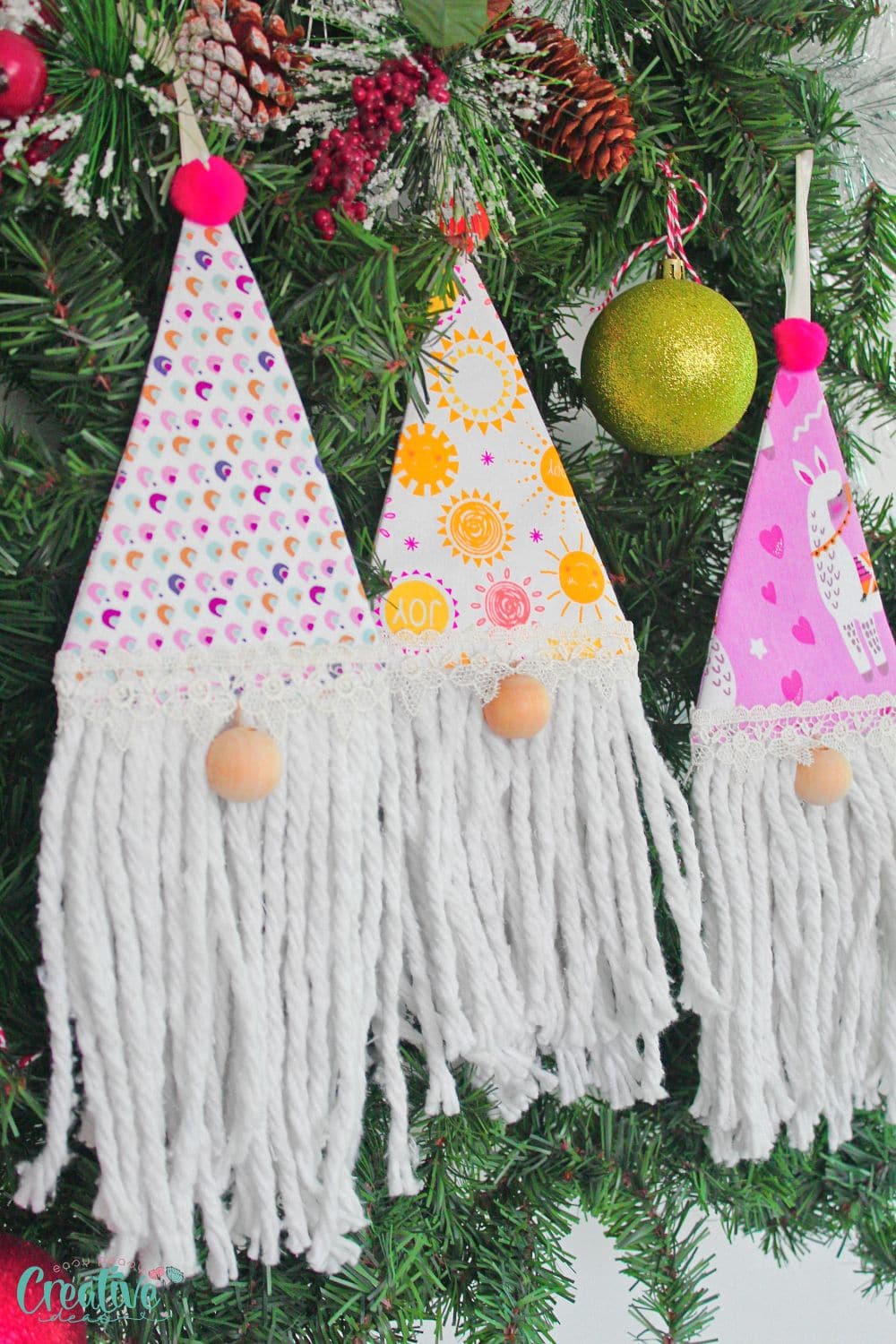 Close up image of gnome ornaments in a Christmas tree