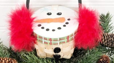 Close up image of DIY snowman from mini basket
