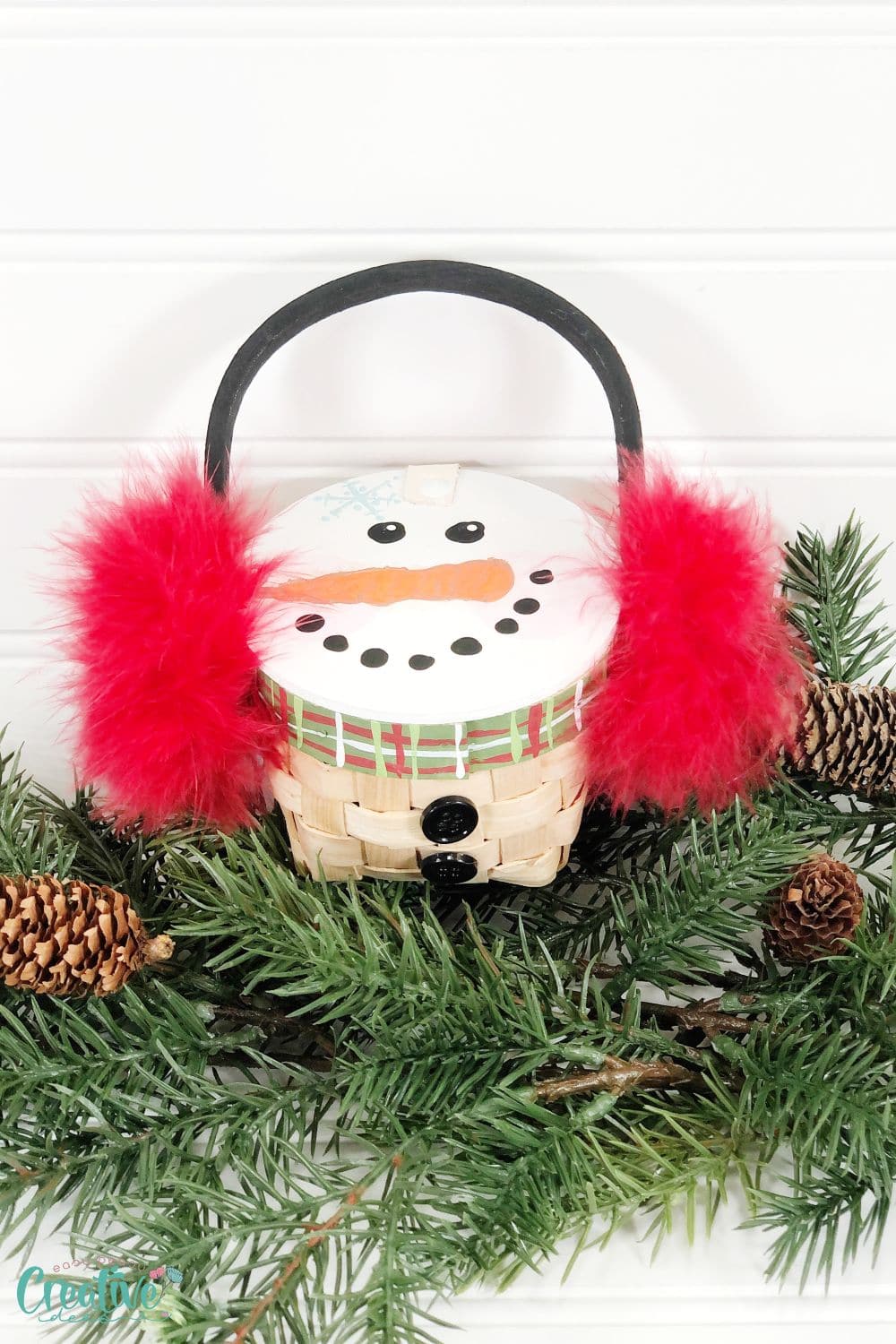 Close up image of DIY snowman from mini basket
