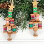 Thread spool Christmas ornaments in a Christmas tree