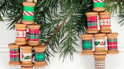 Thread spool Christmas ornaments in a Christmas tree