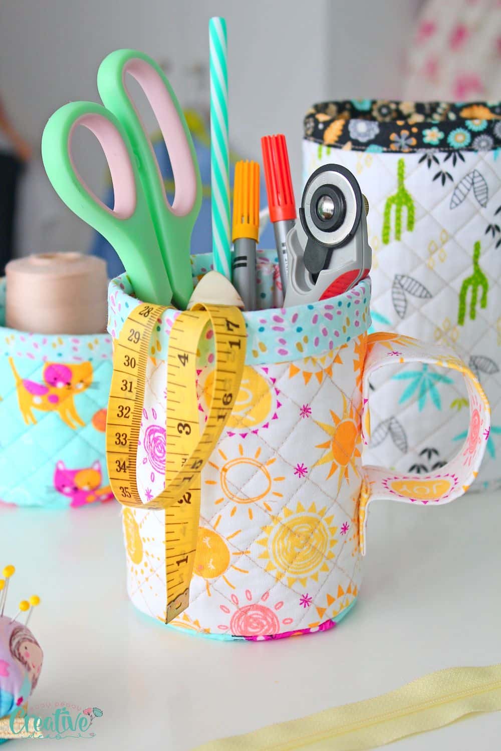 Quilted mug shaped fabric containers