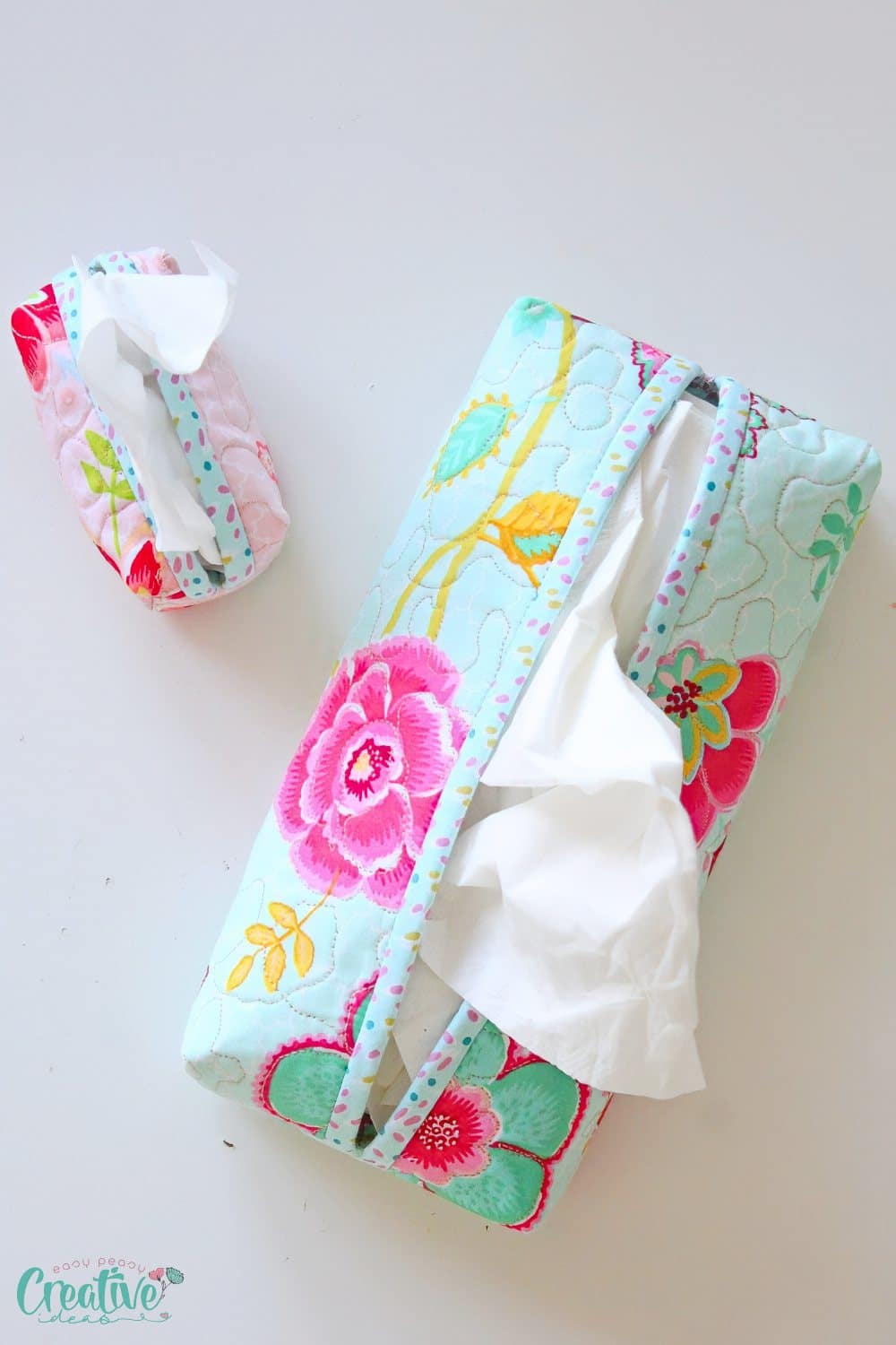 Two handmade fabric tissue holders