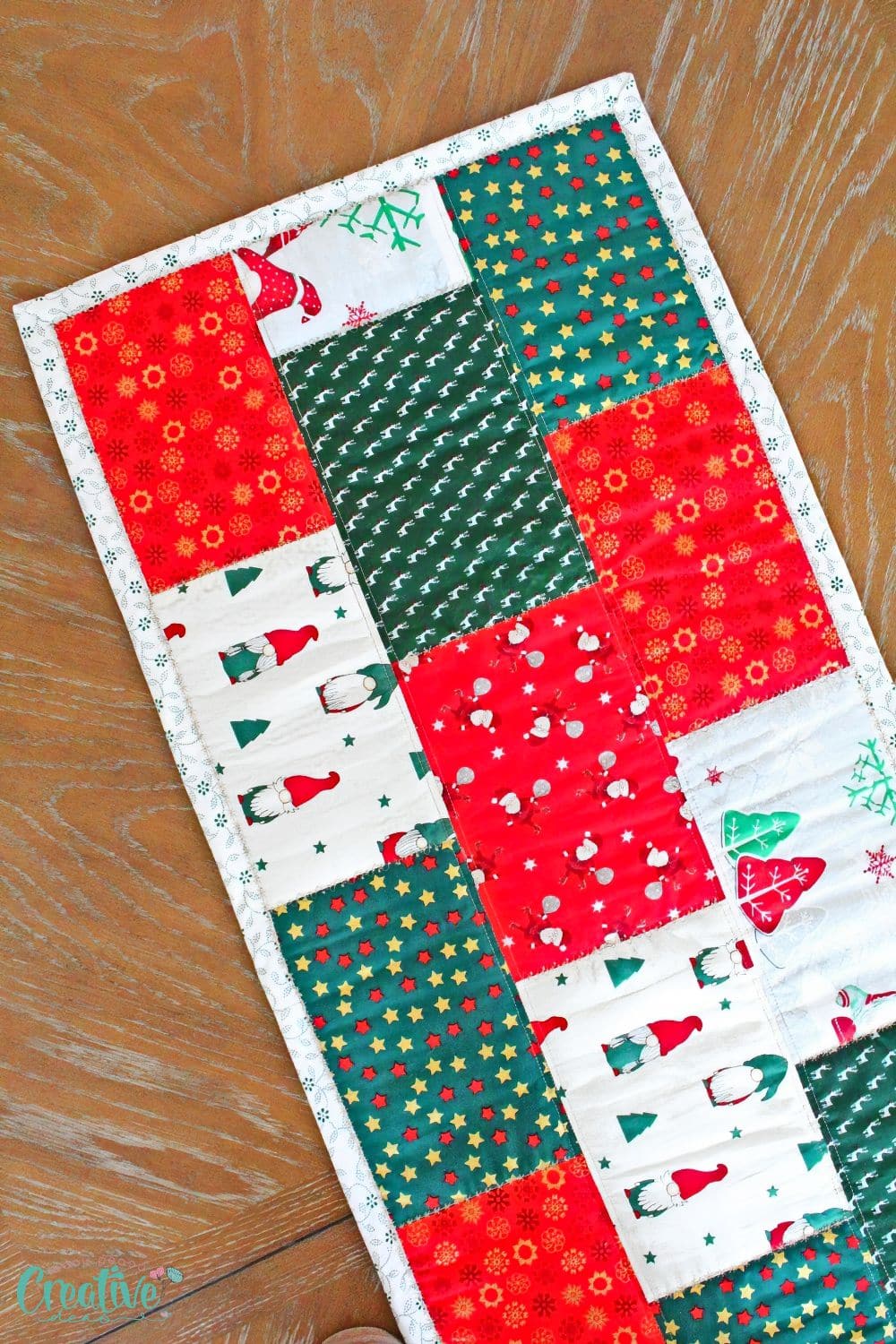 Christmasy bricks quilted table runner