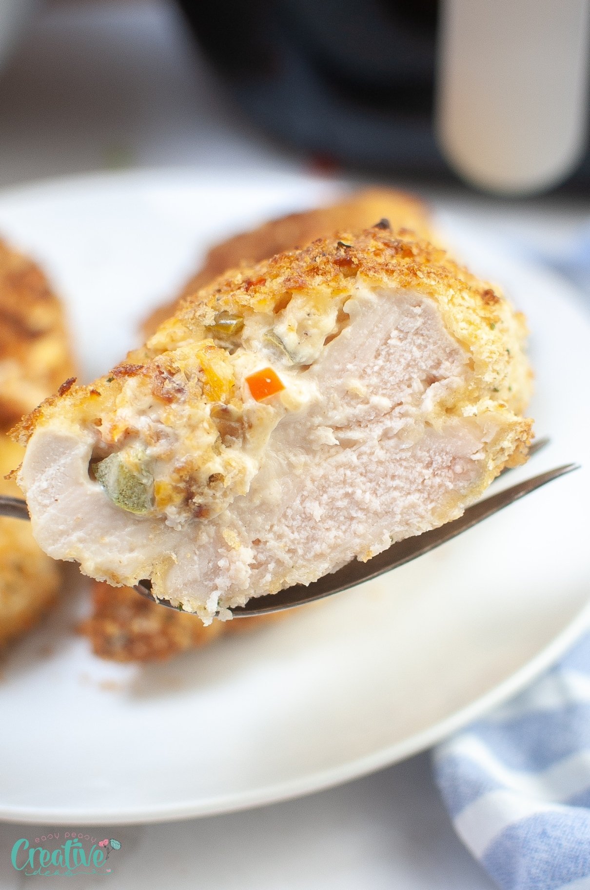 Mouthwatering air fried stuffed chicken breast, a tasty combination of tender chicken and flavorful filling.
