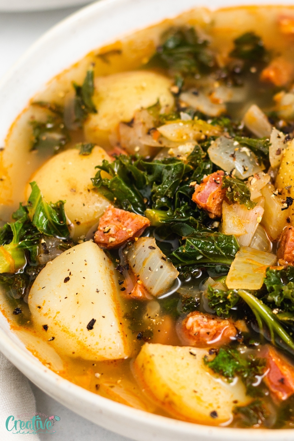 A nutritious bowl of chorizo kale potato soup, flavorful and packed with wholesome ingredients.