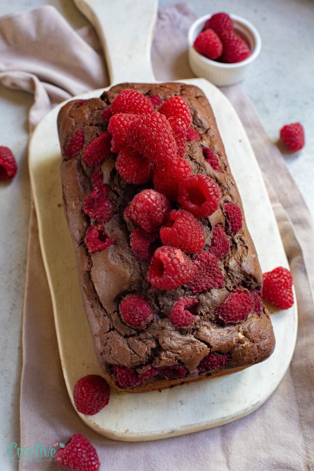 Moist and delicious raspberry chocolate pound cake that will satisfy your cravings! Perfect for any occasion or special indulgence.