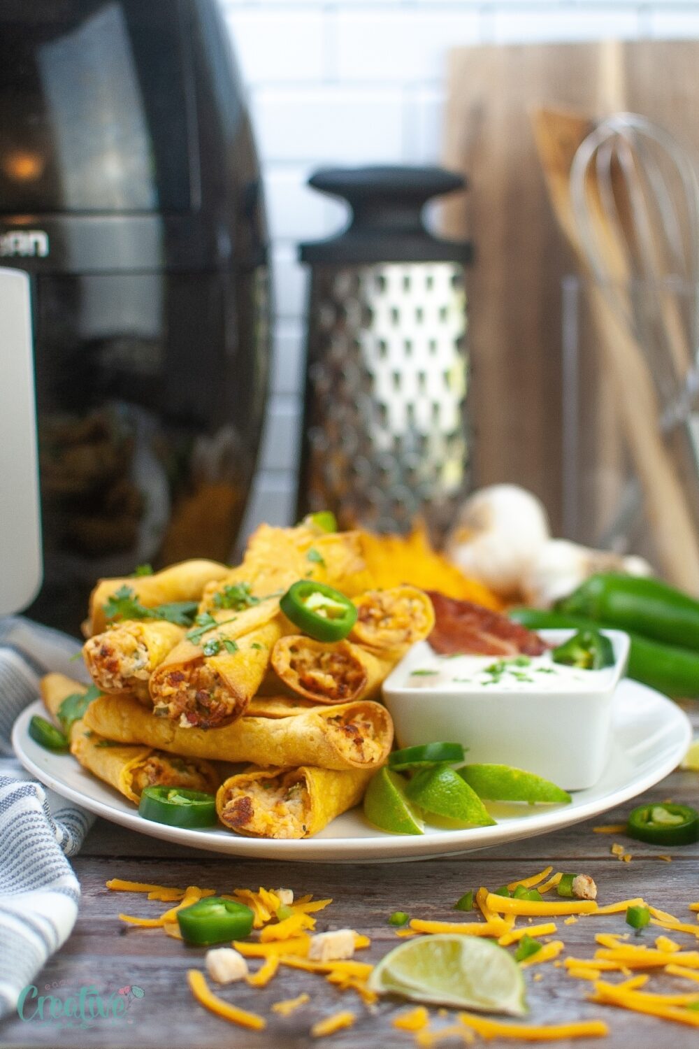 Spicy air fryer taquitos: A spicy treat blending creamy cheese and tangy jalapenos.