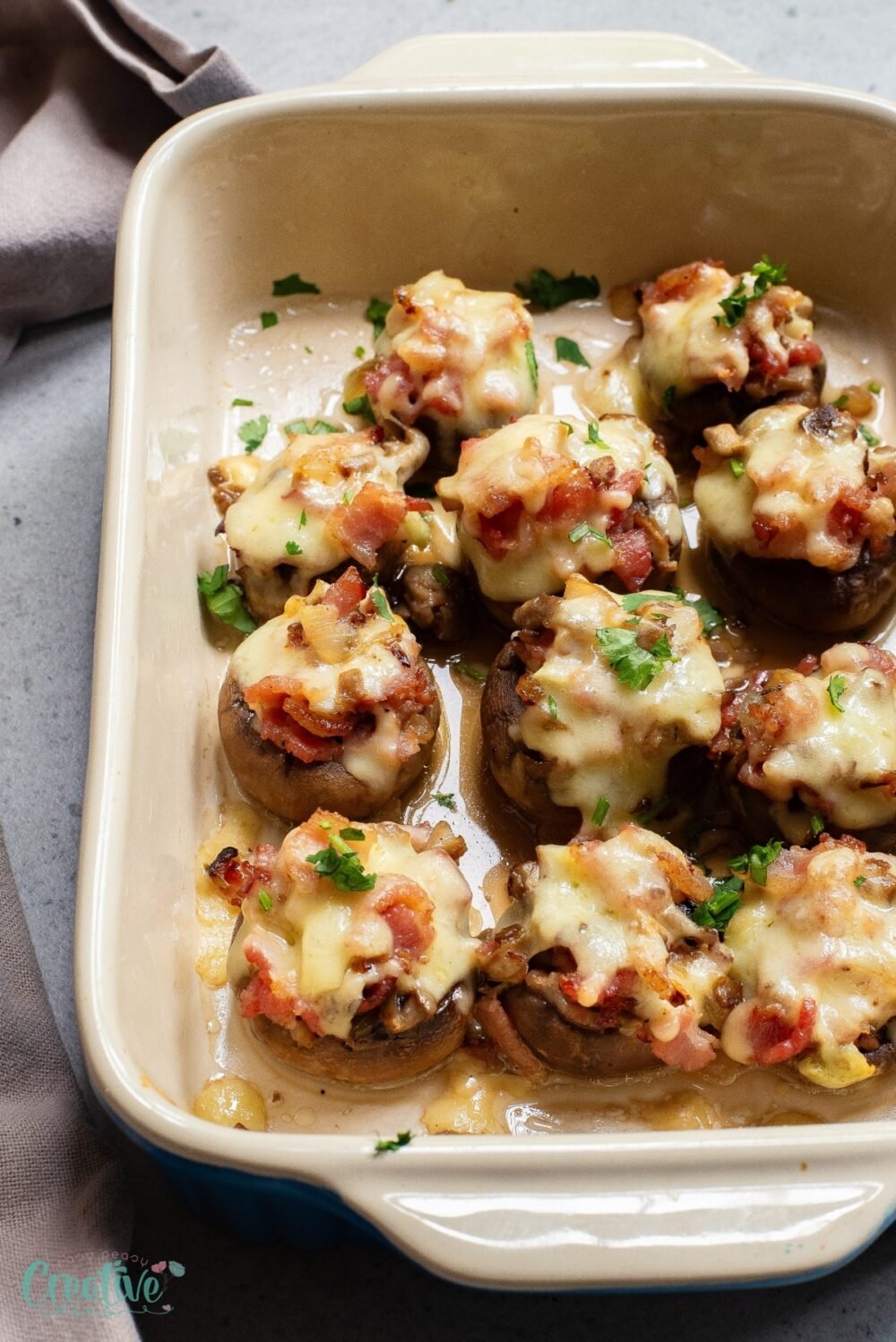 Delicious bacon cheese stuffed mushrooms: a crowd-pleasing appetizer with savory bacon, gooey cheese, and earthy mushrooms.