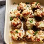 Delicious bacon cheese stuffed mushrooms: a crowd-pleasing appetizer with savory bacon, gooey cheese, and earthy mushrooms.