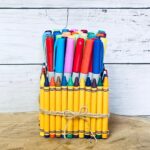 Make a charming custom teacher gift with this tutorial for a a custom crayon box.
